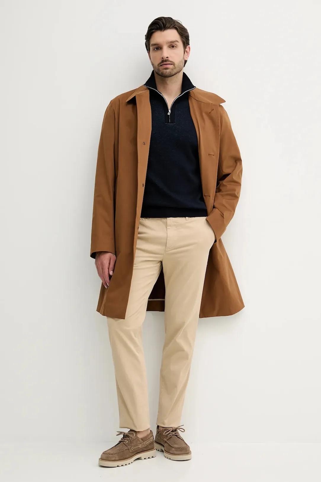 A coat with a stylish cut and a classic touch. Thumbnail 1