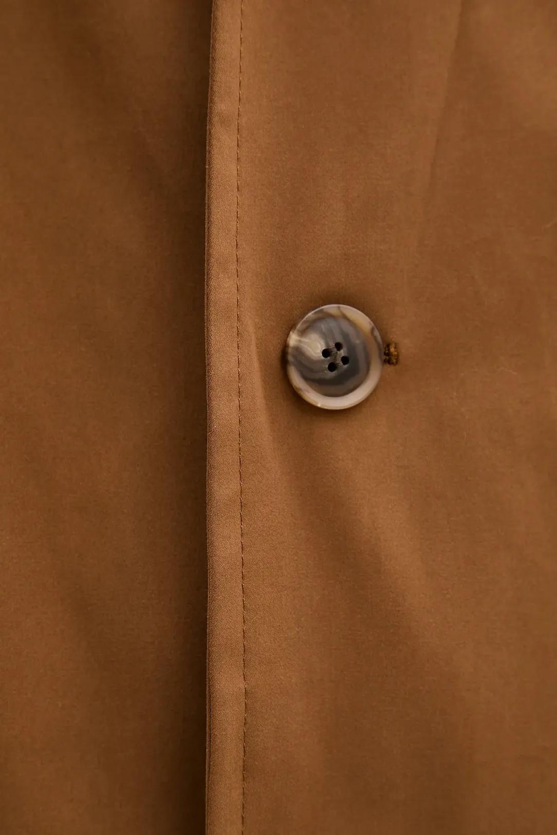 A coat with a stylish cut and a classic touch. media preview 3