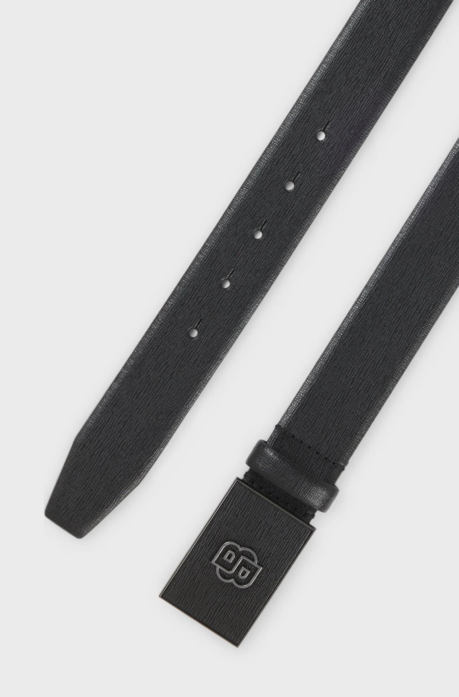 Men's belt featuring a metal buckle for a modern touch media preview 3