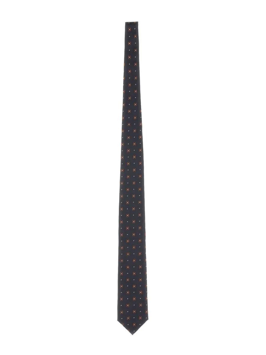 A tie adds a touch of elegance and charm to your look. Thumbnail 1