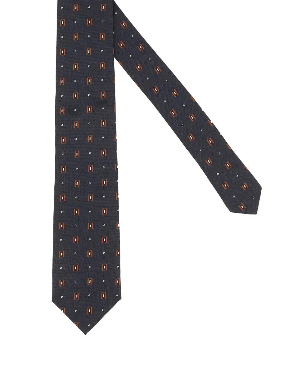 A tie adds a touch of elegance and charm to your look. media preview 2