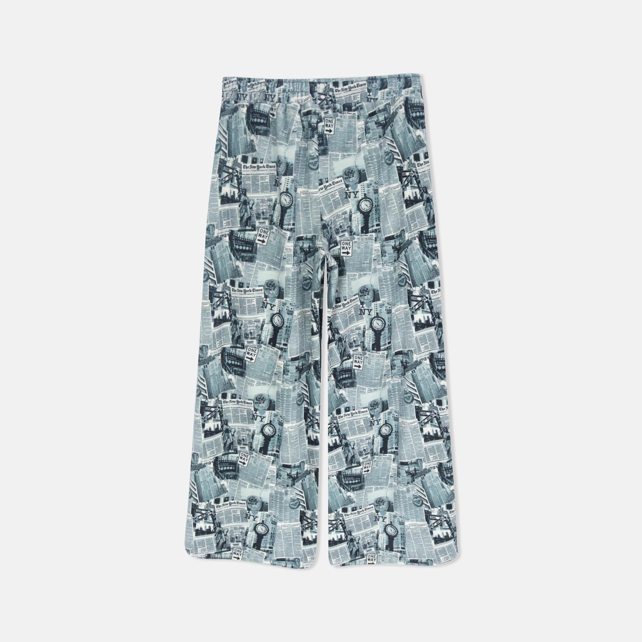 طقم نسائي من قطعتين بنقشة جرائد media preview 8